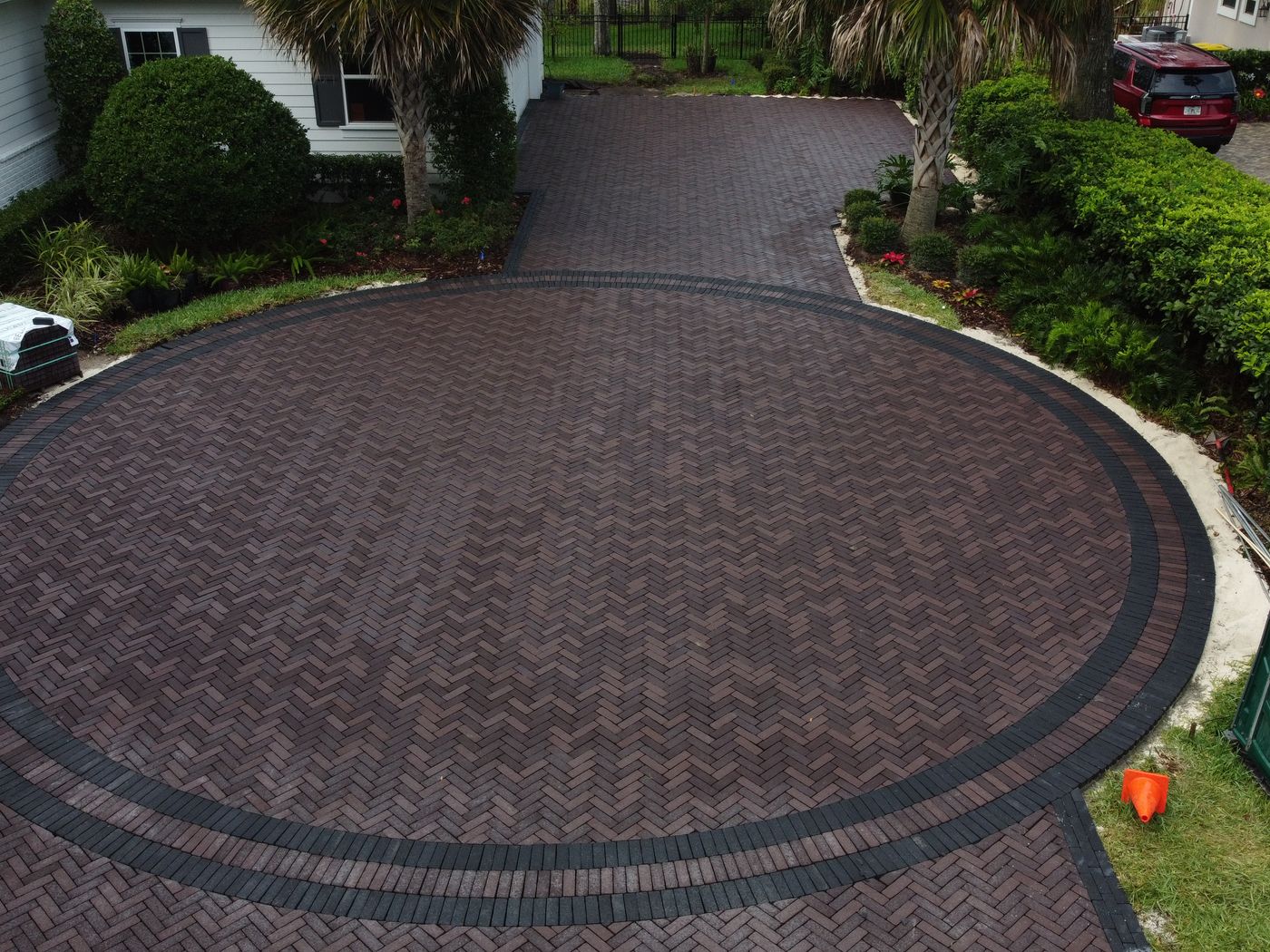 Circular herringbone paver driveway installation, St. Johns County FL