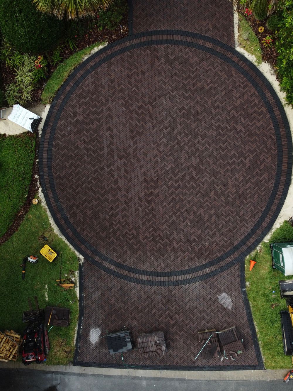 Aerial view of a circular herringbone paver driveway, St. Johns County FL