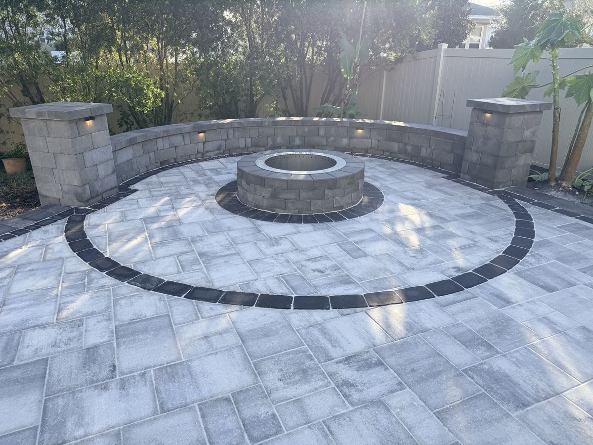 Paver patio with circular firepit and seating wall, Nocatee FL