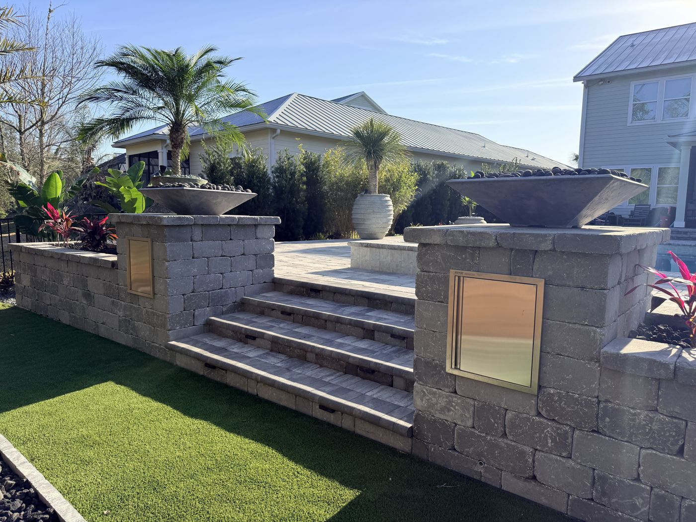 Outdoor kitchen with paver hardscaping and fire bowls, Ponte Vedra FL