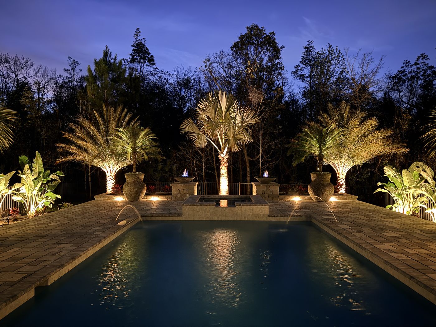 Resort-style paver pool deck patio with landscape lighting, St. Augustine FL