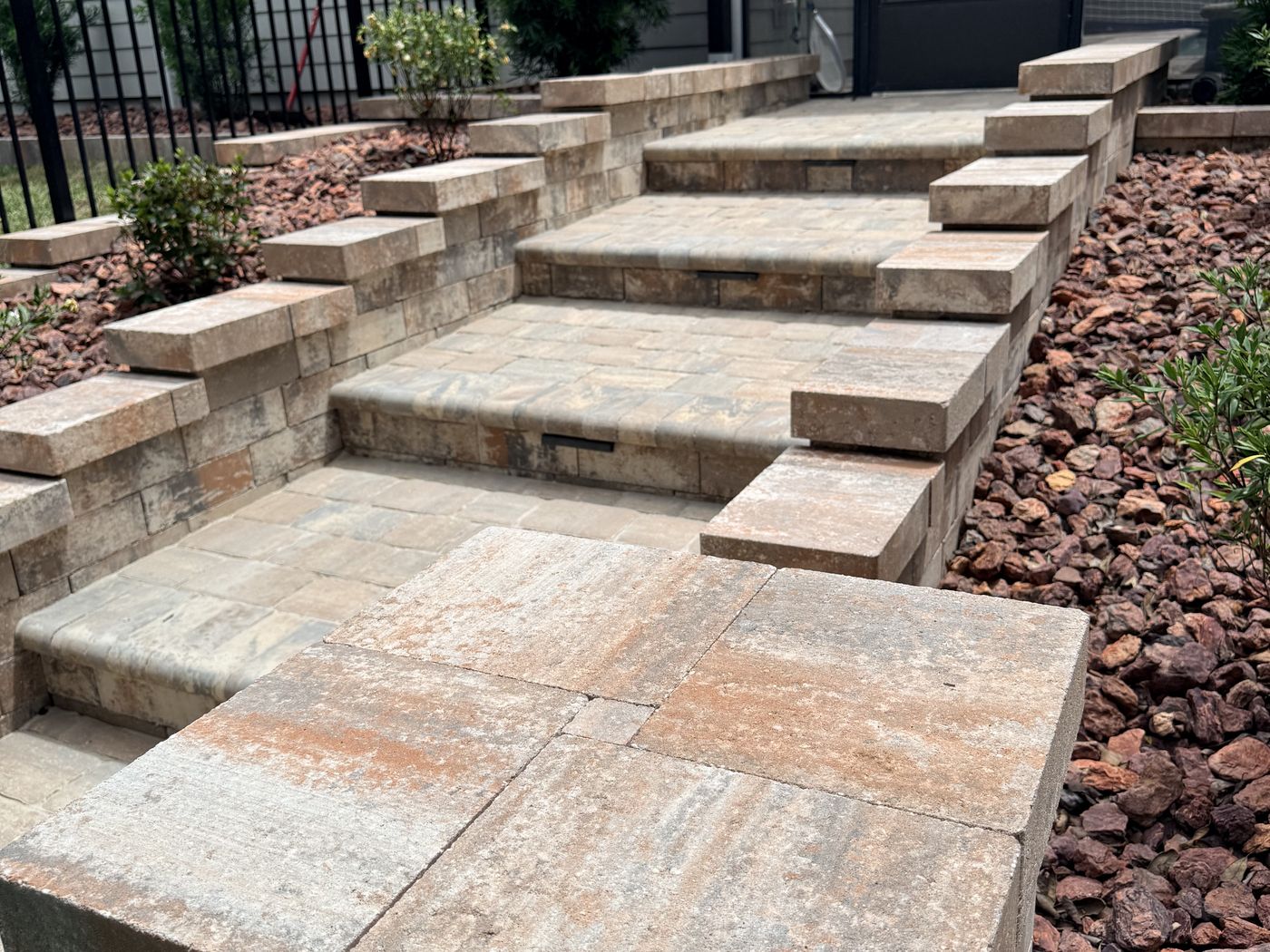 Engineered paver retaining wall with travertine steps, Jacksonville FL